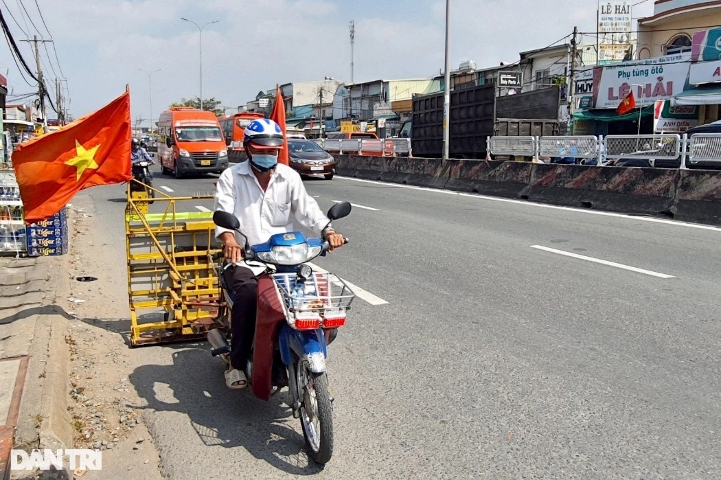 Ba người đàn ông hút đinh miễn phí giúp người dân an toàn những ngày Tết - 1