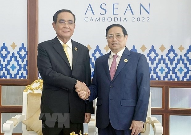 Thủ tướng Phạm Minh Chính và Thủ tướng Thái Lan Prayut Chan-o-cha. Ảnh: TTXVN