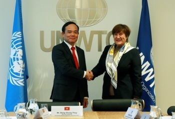 Phó Thủ tướng Trần Lưu Quang gặp giám đốc điều hành tổ chức du lịch thế giới