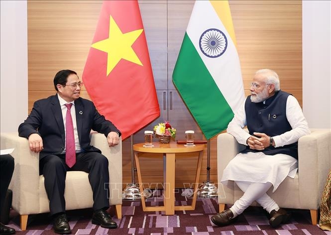 Thủ tướng Phạm Minh Chính gặp Thủ tướng Ấn Độ Narendra Modi. Ảnh: Dương Giang/TTXVN