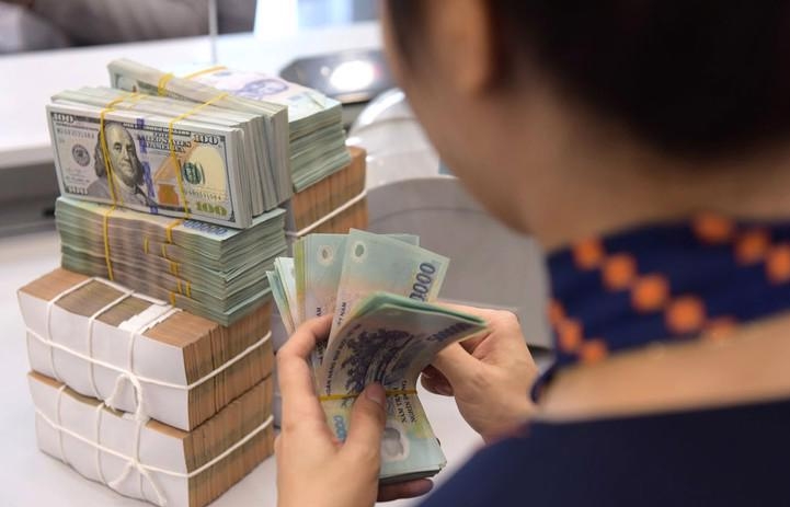 NHNN hạ lãi suất điều hành: Tích cực dài hạn