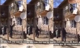 [VIDEO] Cha mẹ "lười" thả con 18 tháng tuổi từ ban công tầng hai xuống đất