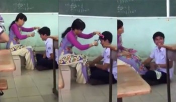 [VIDEO] Cô giáo ngồi cắt tóc cho học sinh trên bục giảng