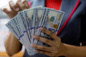 Vì sao tiền Việt Nam vẫn tăng giá bất chấp USD “vọt” mạnh?
