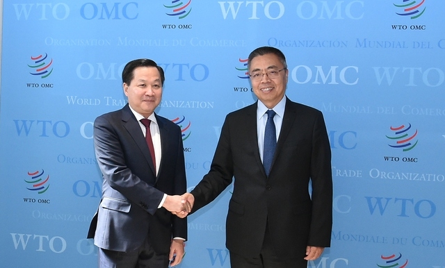 Phó Thủ tướng Lê Minh Khái thăm trụ sở WTO và làm việc với Phó Tổng Giám đốc WTO Trương Hướng Thần