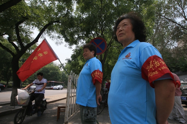 Dân Bắc Kinh tố giác tội phạm qua điện thoại