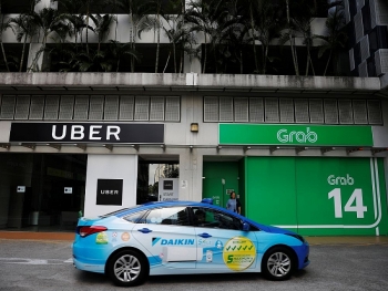 Singapore điều tra thỏa thuận giữa Uber và Grab