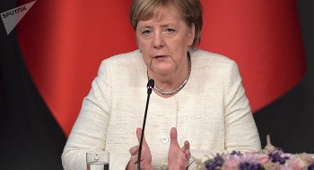 Bà Merkel sẽ không từ chức sớm như dự kiến