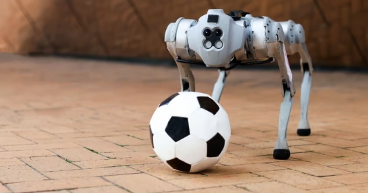 Robot 4 chân DribbleBot có thể kiểm soát bóng trên địa hình phức tạp
