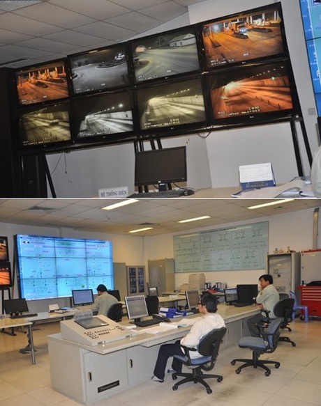 Các kỹ sư đang theo dõi hoạt động trong đường hầm Hải Vân qua màn hình.