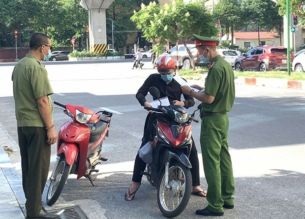 Hà Nội thống nhất mẫu giấy đi đường trong thời gian giãn cách