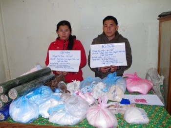 Hai vợ chồng người Lào vận chuyển 78 bánh heroin