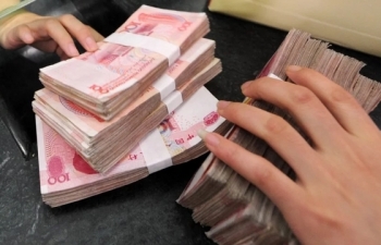Ngân hàng Trung Quốc đe dọa trừng phạt những người quay lưng với tiền mặt