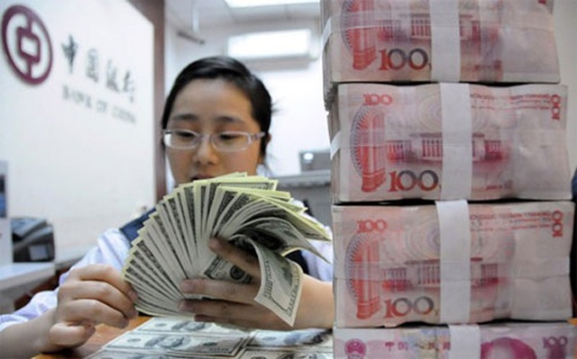 Lí do gì khiến Trung Quốc bất ngờ “xả hàng” nợ Mỹ? - 1