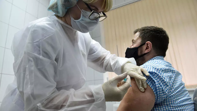 Nga nộp đơn hối thúc WHO phê duyệt nhanh vắc xin Covid-19 - 1