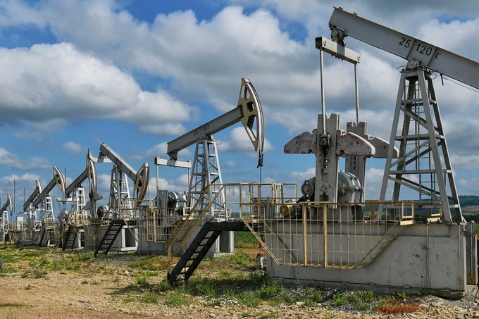 Nga tính cắt giảm sản lượng dầu để đối phó trần giá của phương Tây - 1