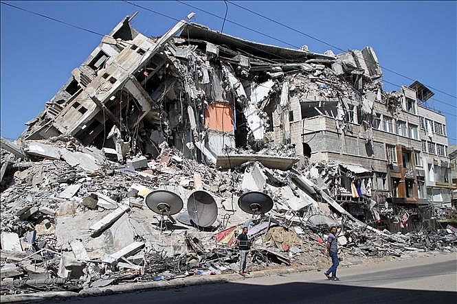 Nhà cửa bị tàn phá sau các cuộc không kích của Israel xuống Dải Gaza,