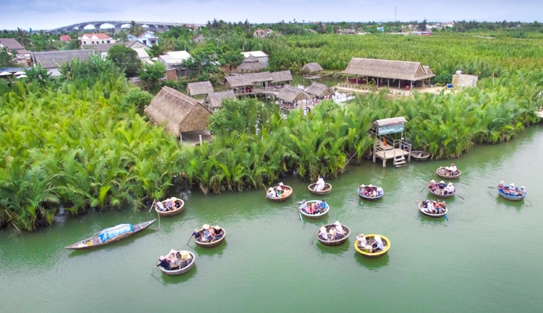 Experience basket dance on the river at Bay Mau coconut forest - Hoi An